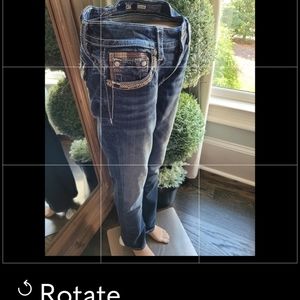 MISS ME Jean's size 30..w/ brown and tan designs on pockets